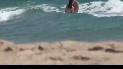Couple split by strangers on a nude beach - sunporno.com